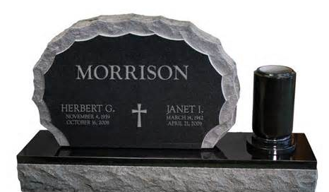 This is an example of a smaller option for a double upright monument with a single vase made from a granite base and jet black material. 
